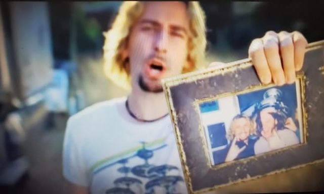 Chad Kroeger holding frame from song Photograph Chad Kroeger holding frame from song Photograph